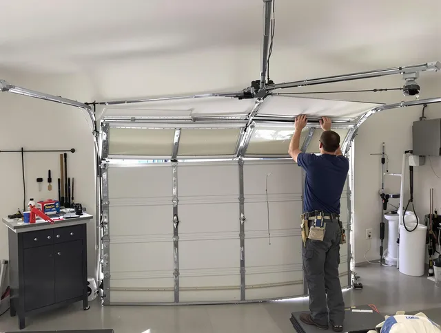 Delray Beach Garage Door Repair specialist performing precise section replacement on Delray Beach garage door